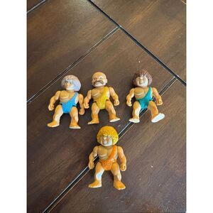 Vintage 1987 Playskool definitely dinosaurs, baby caveman bundle of four